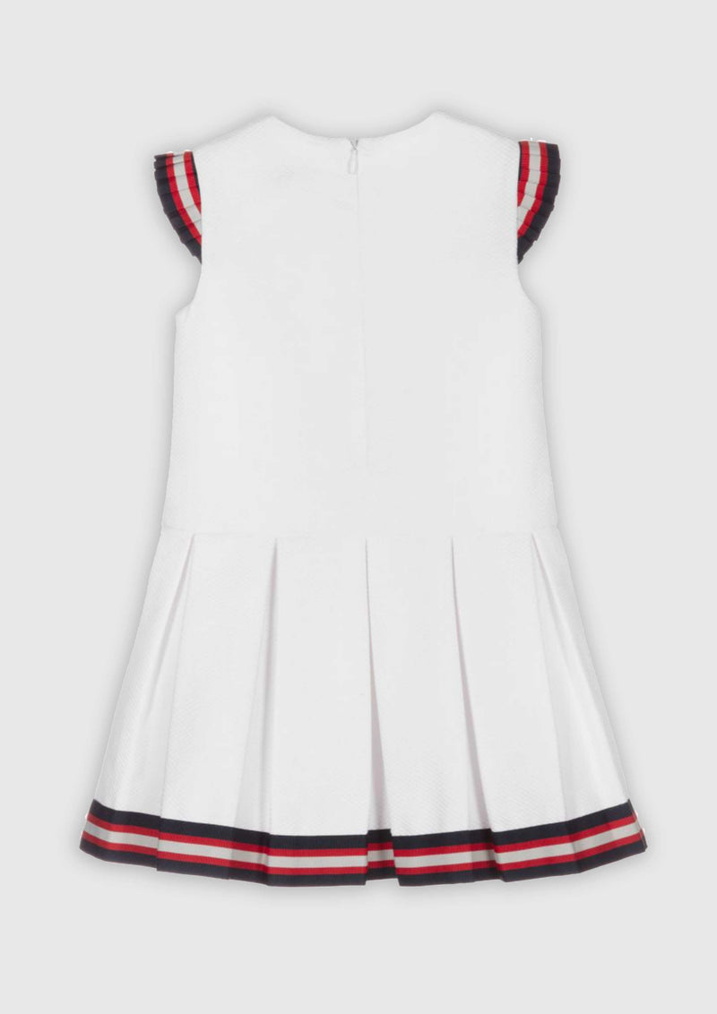 White Pique Low-Waisted Pleated Dress with Striped Ribbon Bows.